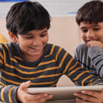 Two Boys Reading on Tablet